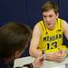 Michigan's Matt Vogrich answers a question from a reporter during media day at the Player Development Center on Wednesday. Melanie Maxwell I AnnArbor.com